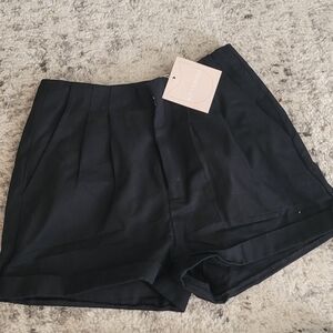 Kittenish Black Pleated Shorts